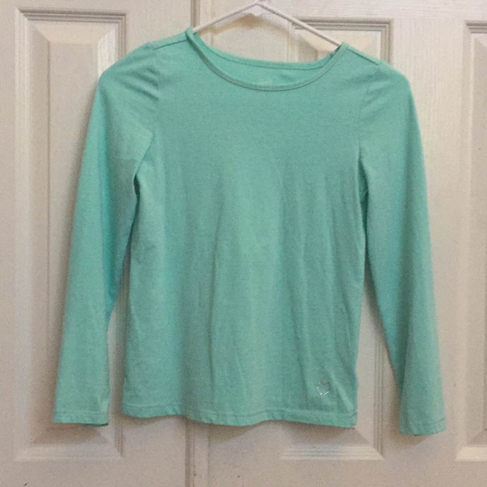 A teal plain shirt
